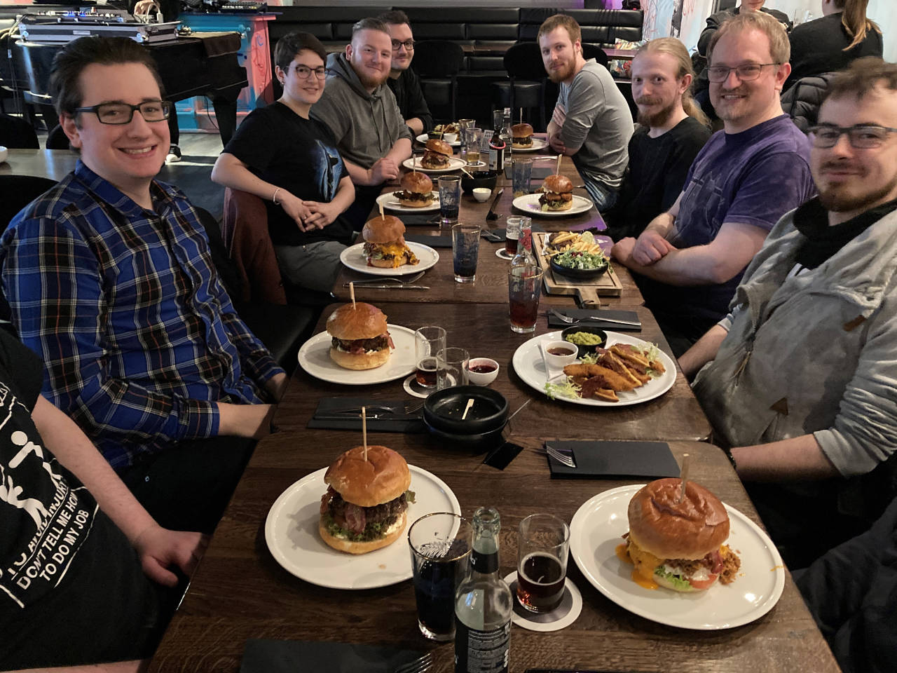 Subsequent team photo while eating burgers